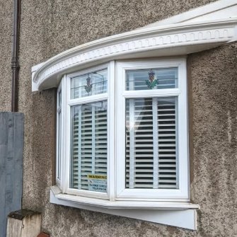 Bow window canopy clean and white after