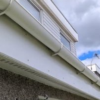 White fascia and gutter after