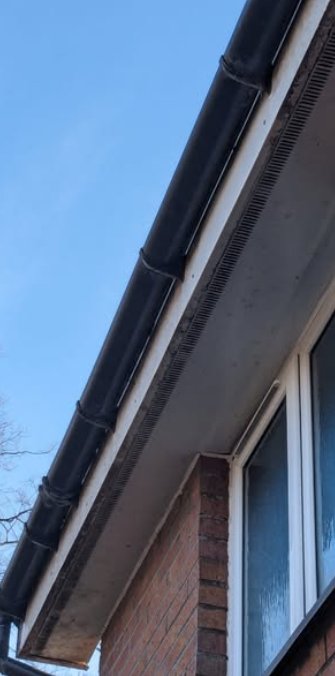 Soffit with black streaks before